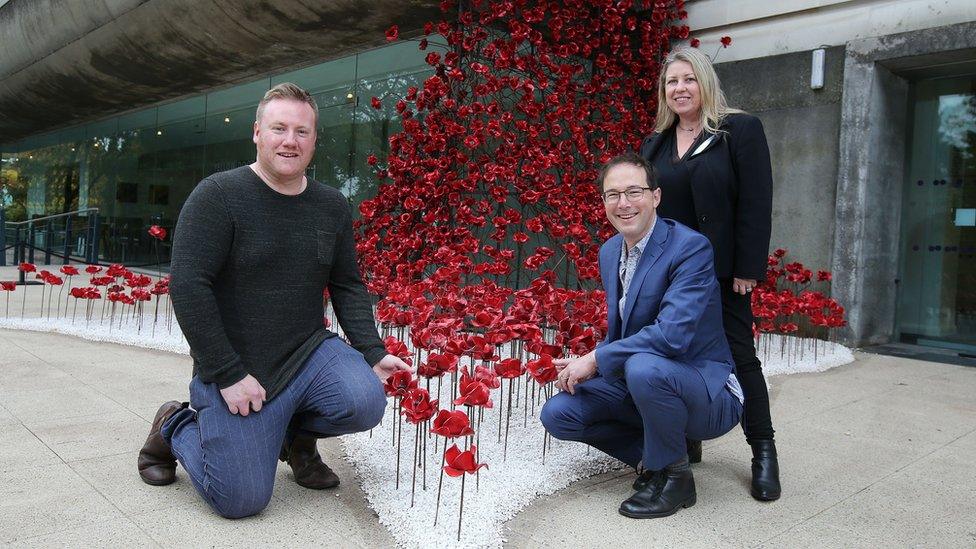 Paul Cummins, Tom Piper and Kim Mawhinney at the Weeping Window at the Ulster Museum