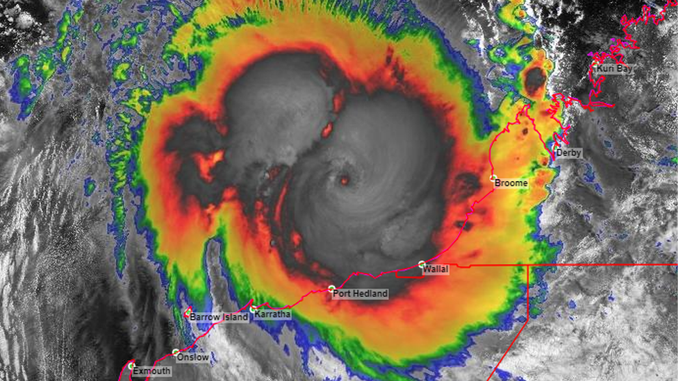 Satellite image of the storm against a map of WA