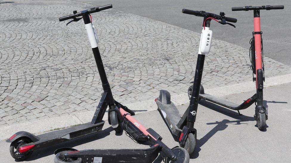 Scooters parked on the pavement in Paris