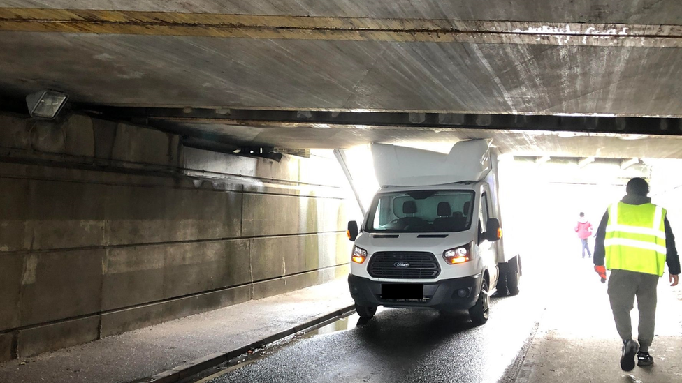 Vehicle stuck under Ely bridge