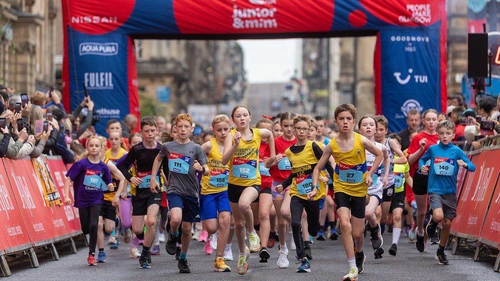 Dozens of young runners at the start of the Great Scottish Junior Run in George Square, Glasgow  