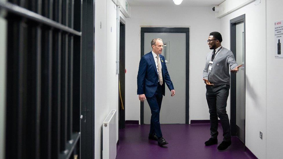 Deputy Prime Minister and Justice Secretary Dominic Raab is given a tour of category C prison HMP Five Wells in Wellingborough