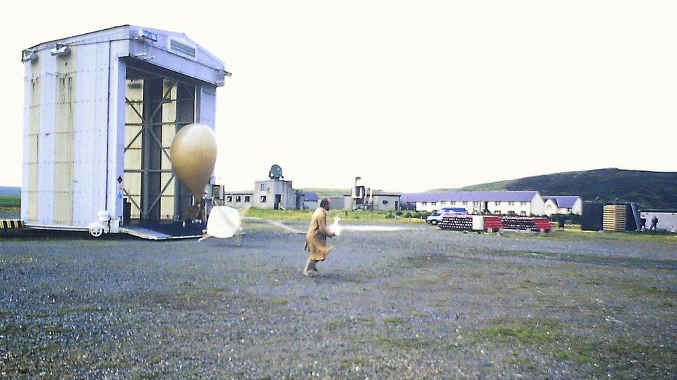 Man with weather balloon