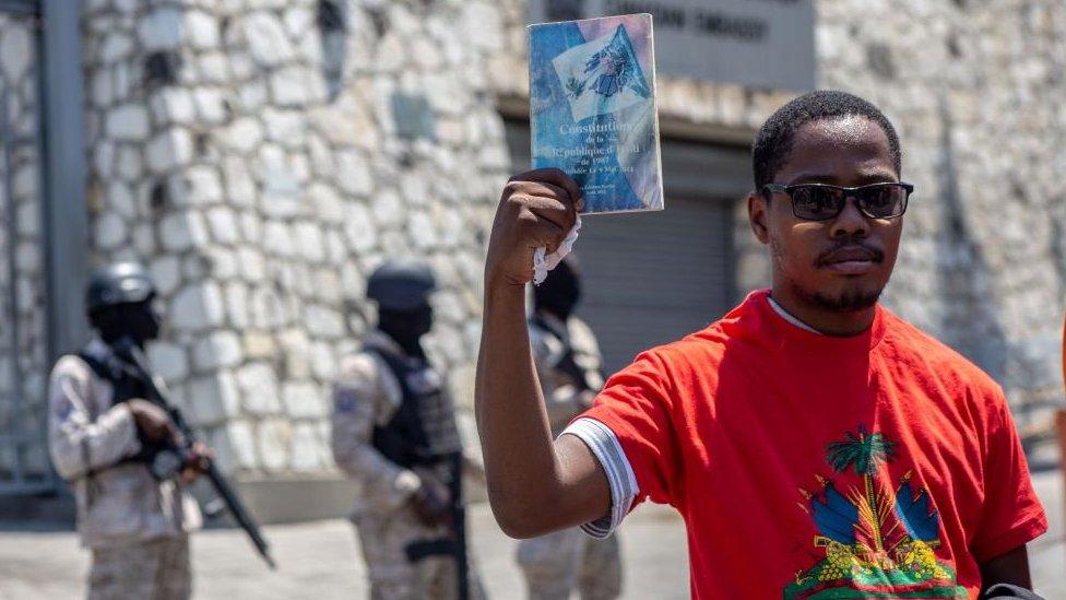 Protesters gather in front of the Canadian embassy in commemoration of the anniversary of the 1987 constitution, demanding that the Caribbean Community (CARICOM) respect the constitution, in Port-au-Prince, Haiti, 29 March 2024