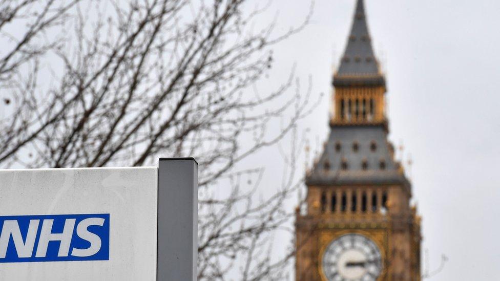 NHS sign outside Parliament