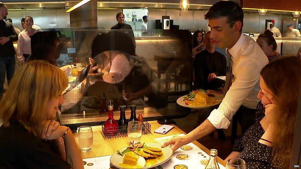 Rishi Sunak serving meals to customers