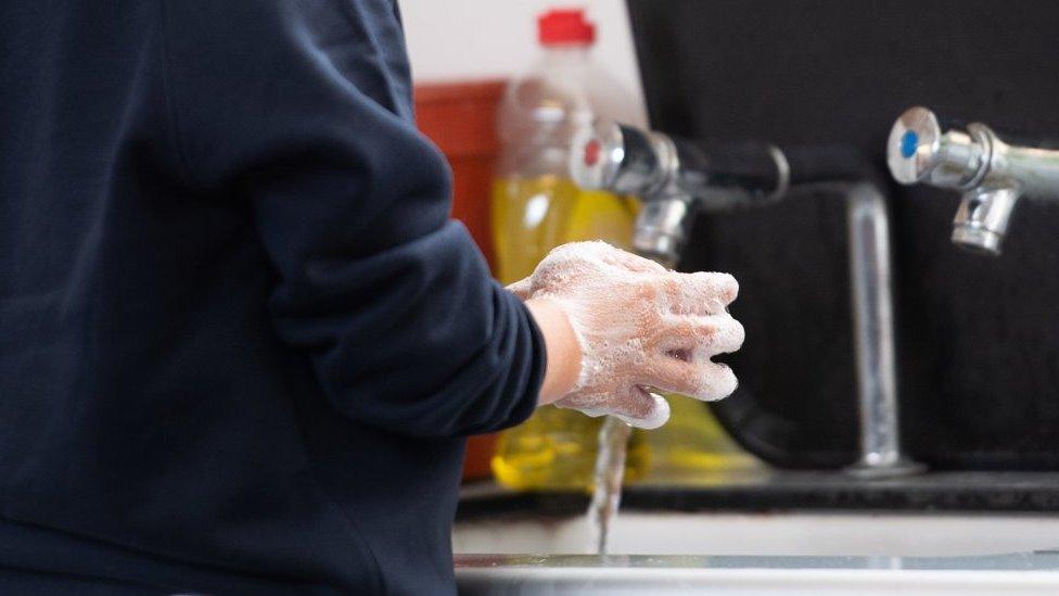 Pupil washing hands