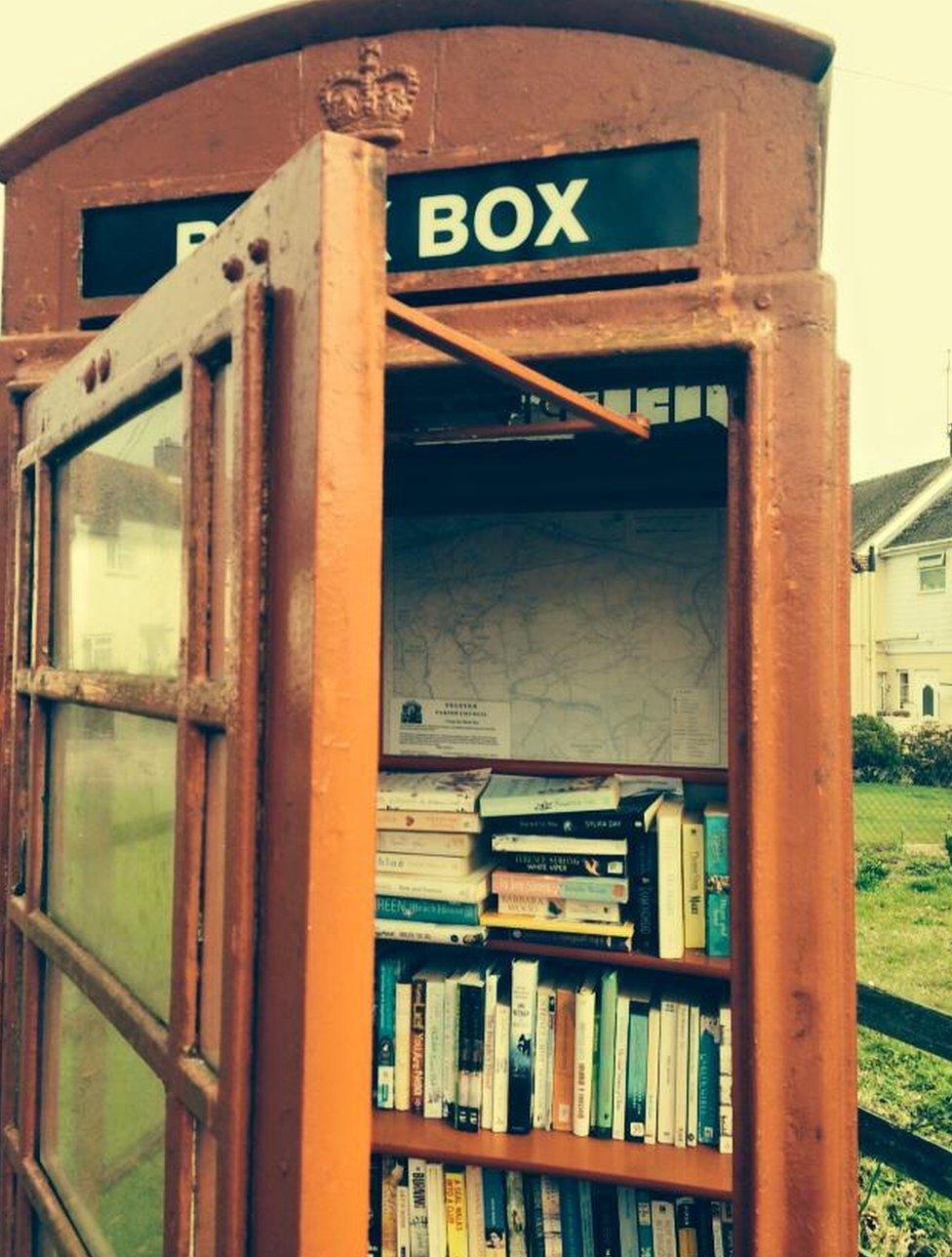 A phone box used as a library in Felsted, Essex