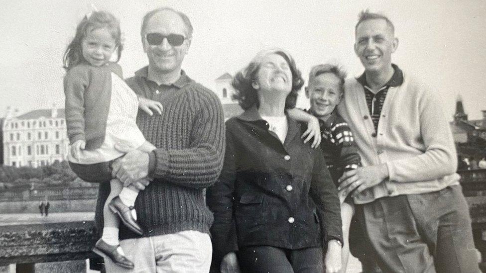 Ernie Jones on the left of this family photo, with Mark Baker, who also played for Swansea, on the right