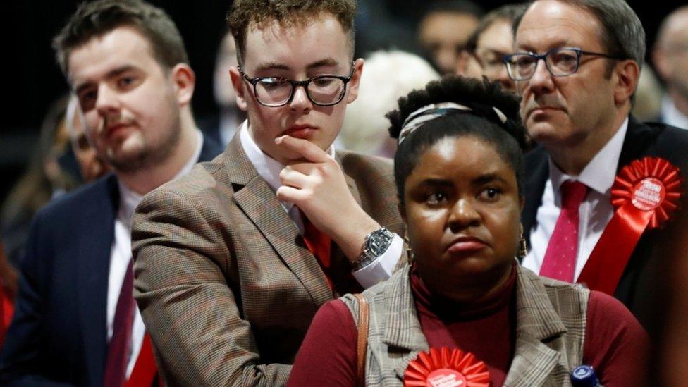 Labour Party supporters react at a counting centre for Britain"s general election in Glasgow