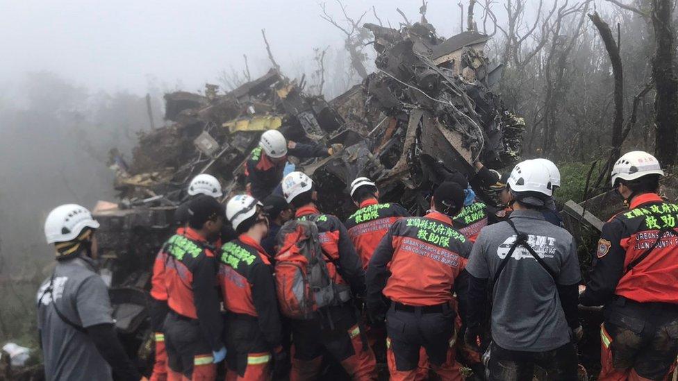 Rescuers at the scene of the emergency landing