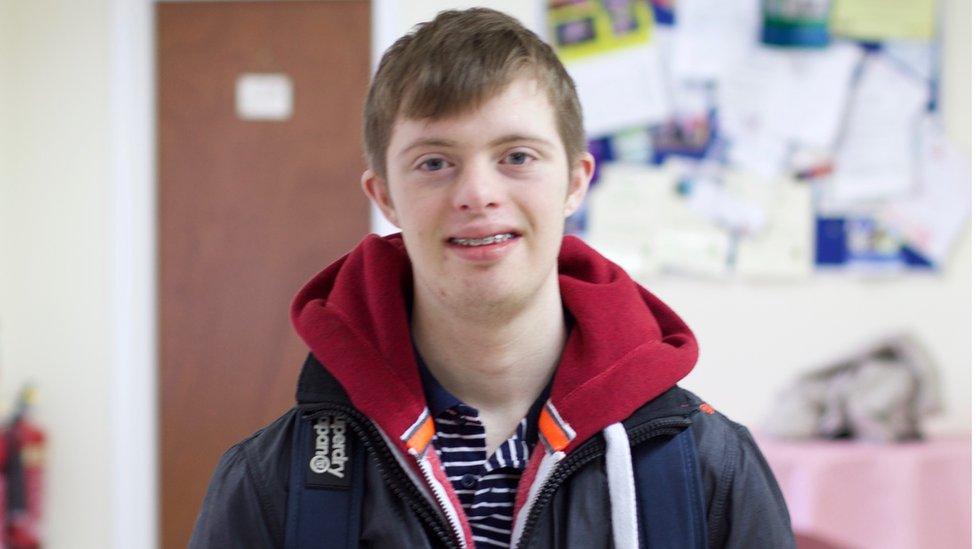 Young man smiling at the camera