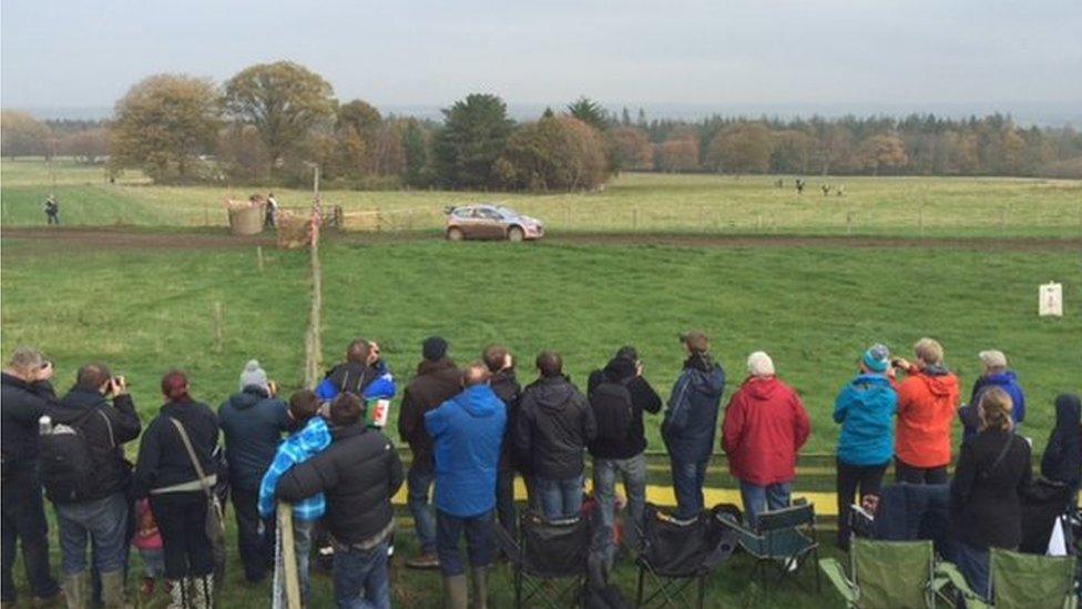 Rally car and spectators