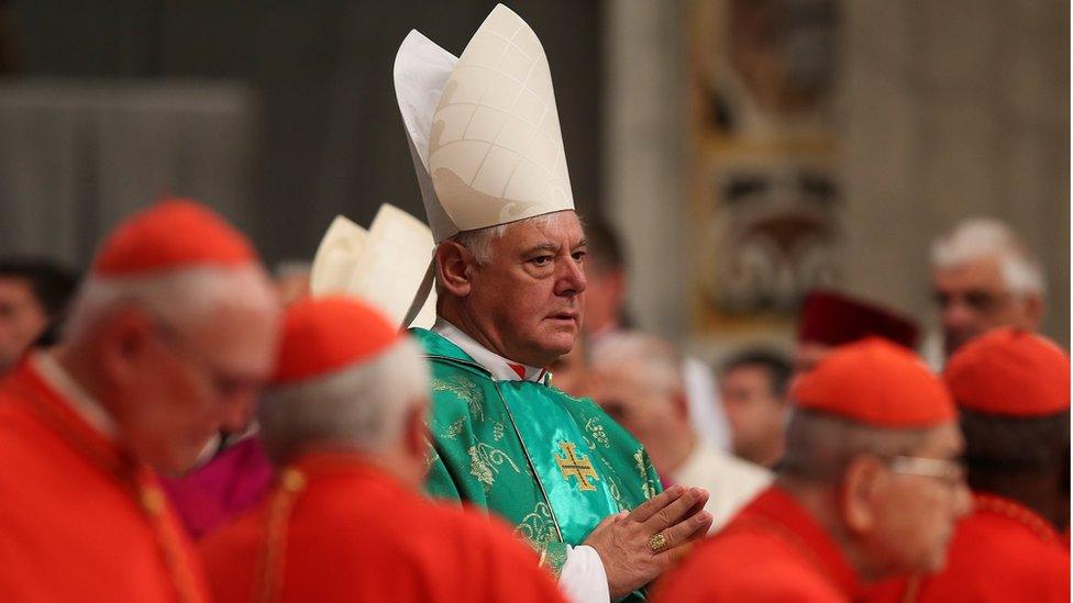 Newly elected cardinal Gerhard Ludwig Muller of Germany arrives during a consistory ceremony led by Pope Francis in Saint Peter"s Basilica at the Vatican February 22, 2014.