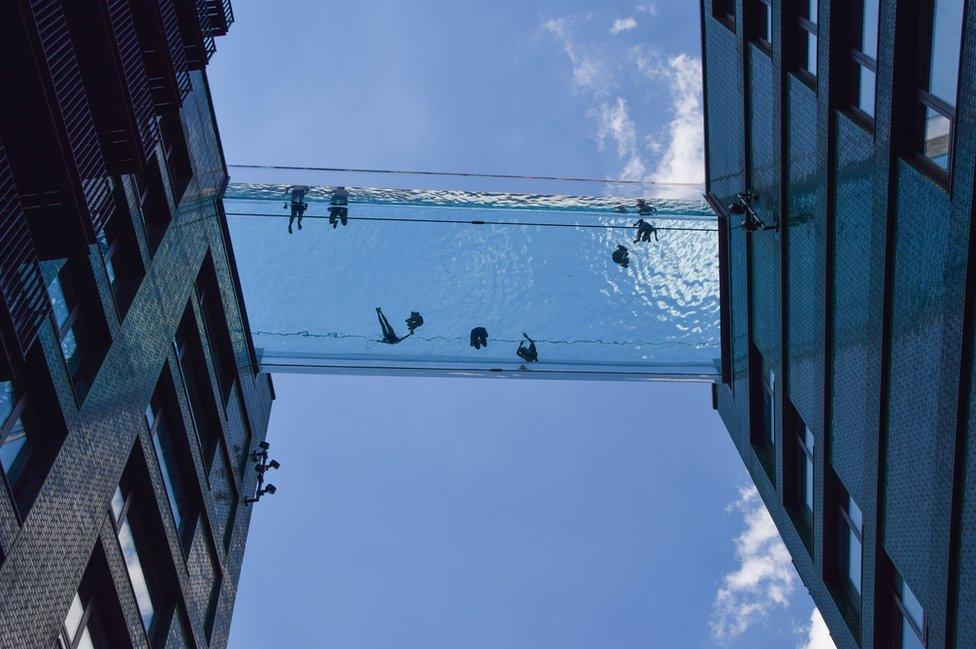 Sky Pool, described as the world's first floating pool, opened in Nine Elm