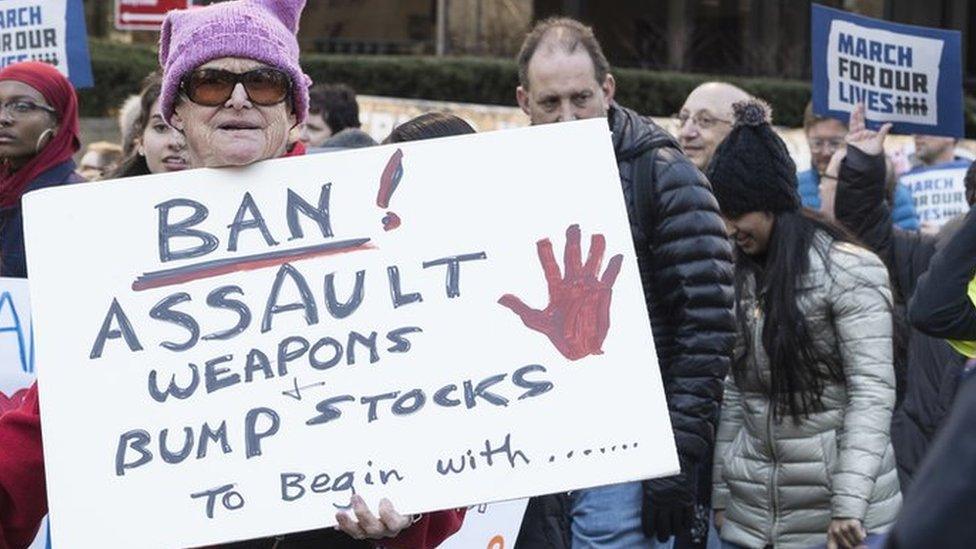 A protestor holds a banner at the March for Life in Washington DC, 2018