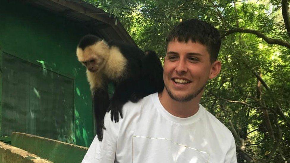 Danny Castledine with a monkey on his shoulder 