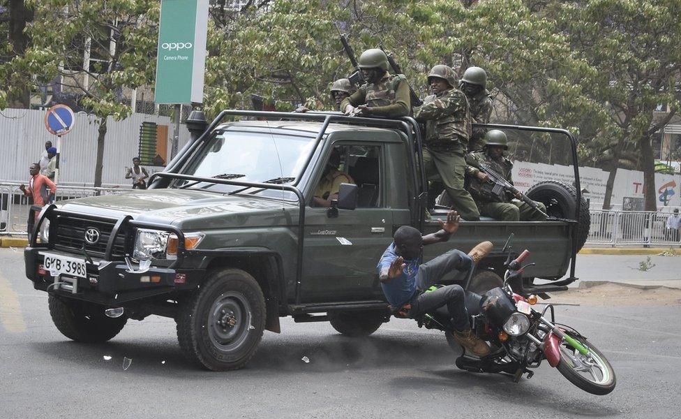 Motorcycle rider ran over by police