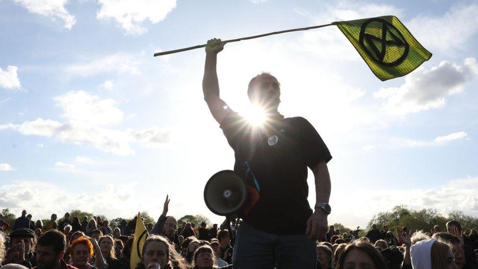 protester waving flag