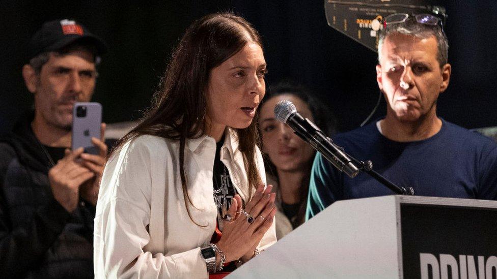 Moran Stella Yanai speaking at a rally demanding the return of hostages