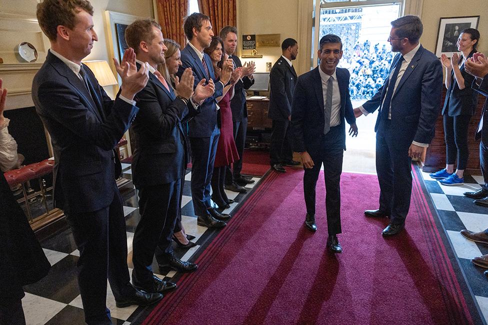 Rishi Sunak enters Downing Street as the new prime minister