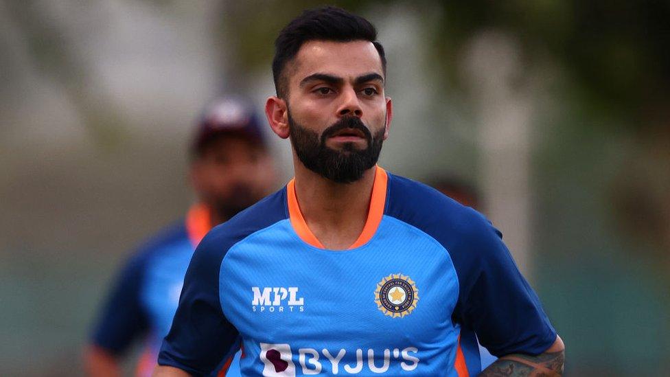 Virat Kohli of India warms up during a training session at ICC Academy on August 25, 2022 in Dubai, United Arab Emirates.