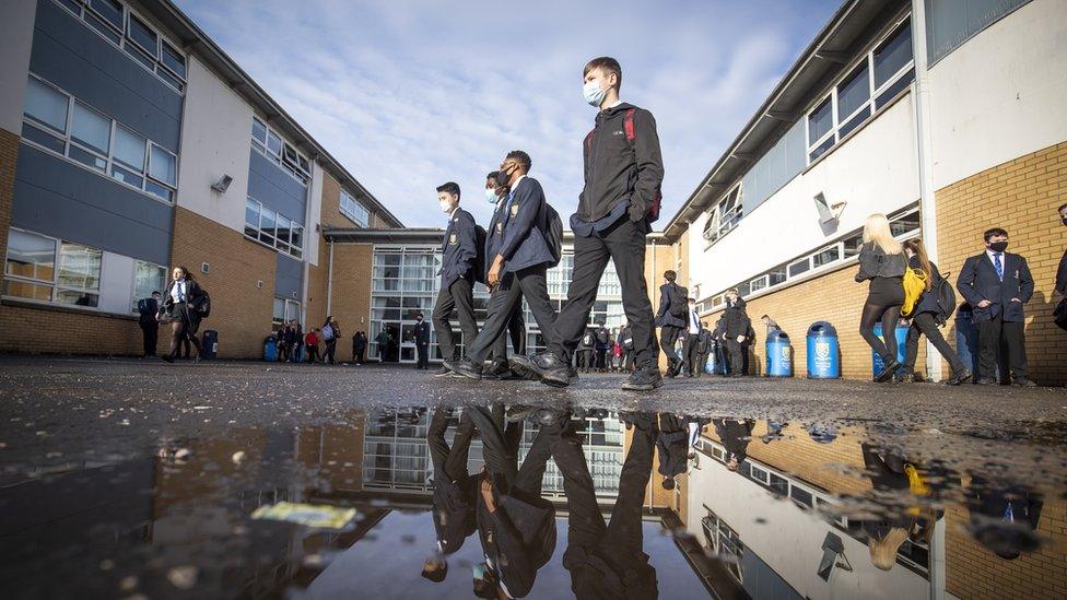 School pupils arrive at St Andrew's RC Secondary School in Glasgow