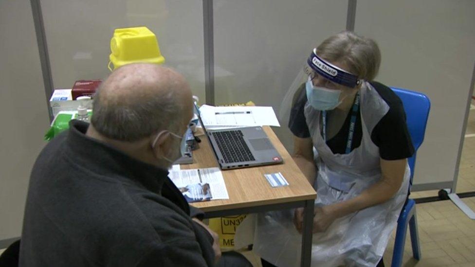 Nurse with patient at the new vaccination hub in Ipswich