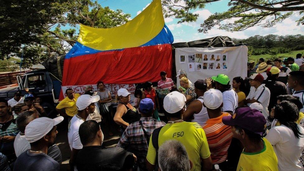 Protesters block road linking Venezuela and Brazil