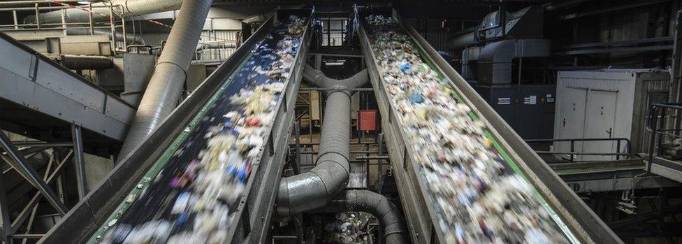 Conveyor belts transport plastic waste at the ALBA Group recycling plant in Berlin, Germany