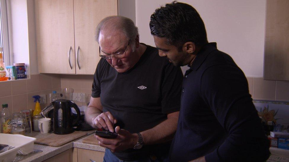 Catfish victim Roy showing reporter Athar Ahmad conversations he had with someone pretending to be someone else.