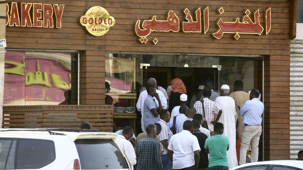 People queuing for bread in Sudan