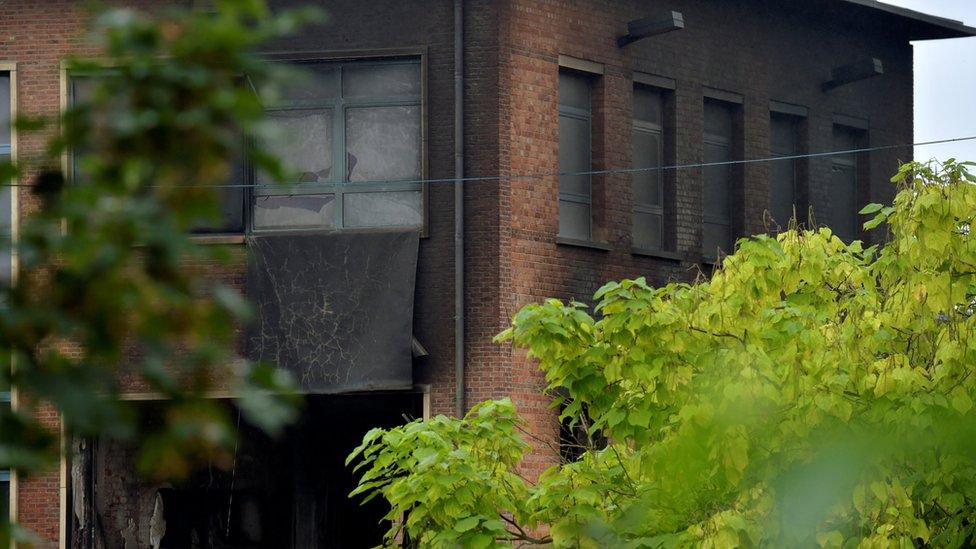 A view shows a partially destroyed part of the Belgium"s National Institute of Criminology after arsonists set fire to it in Brussels, Belgium August 29, 2016