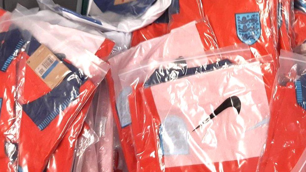 Fake England shirts in plastic packaging