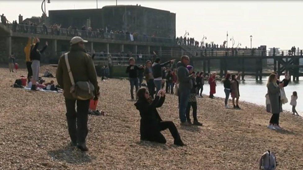 People wave off ships at Portsmouth Harbour