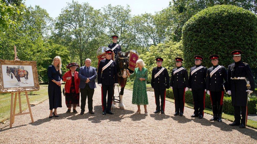 Queen Camilla with Juno and soldiers