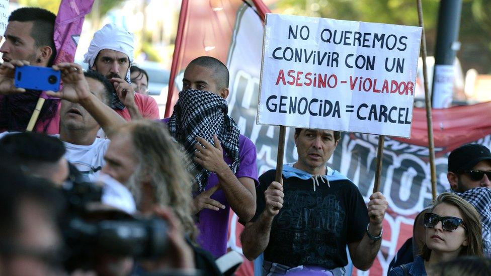 Activists demonstrate outside former Buenos Aires police chief Miguel Etchecolatz's house to protest, after the justice allowed him to serve the rest of his life imprisonment at home due to his advanced age in Mar del Plata, Argentina on January 07, 2018.