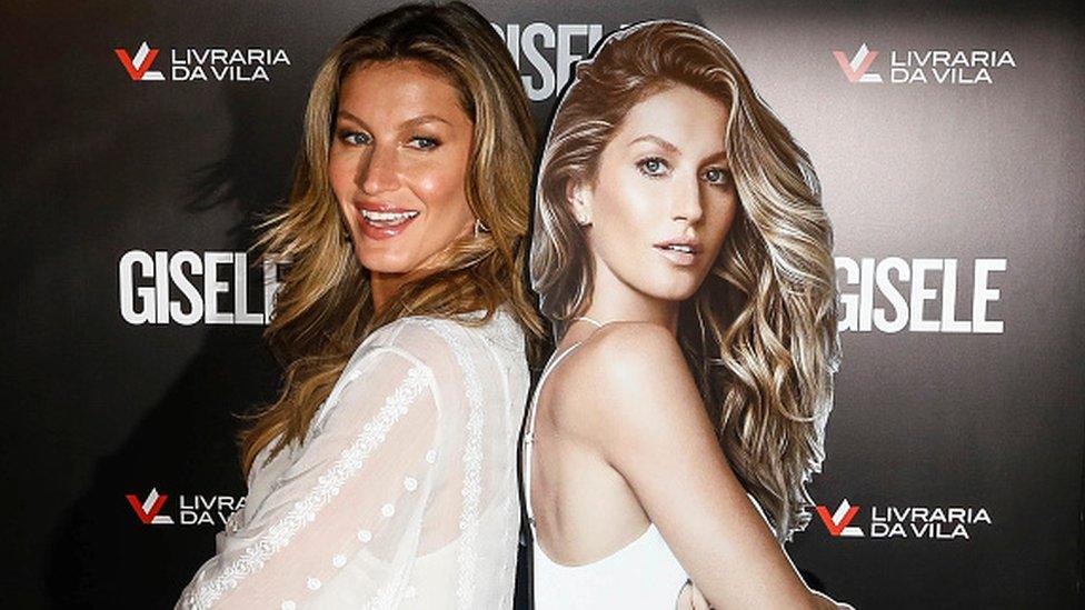 Brazilian model Gisele Bundchen poses for pictures during a book signing (06 November 2015)