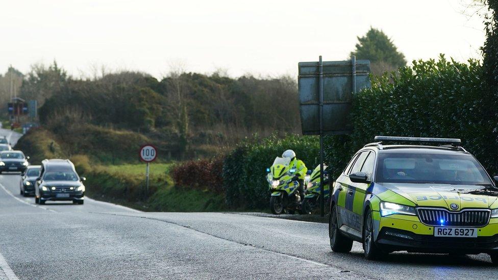 The funeral cortege of Private Sean Rooney as it crosses the border from the Republic of Ireland into Northern Ireland on it's way to Donegal