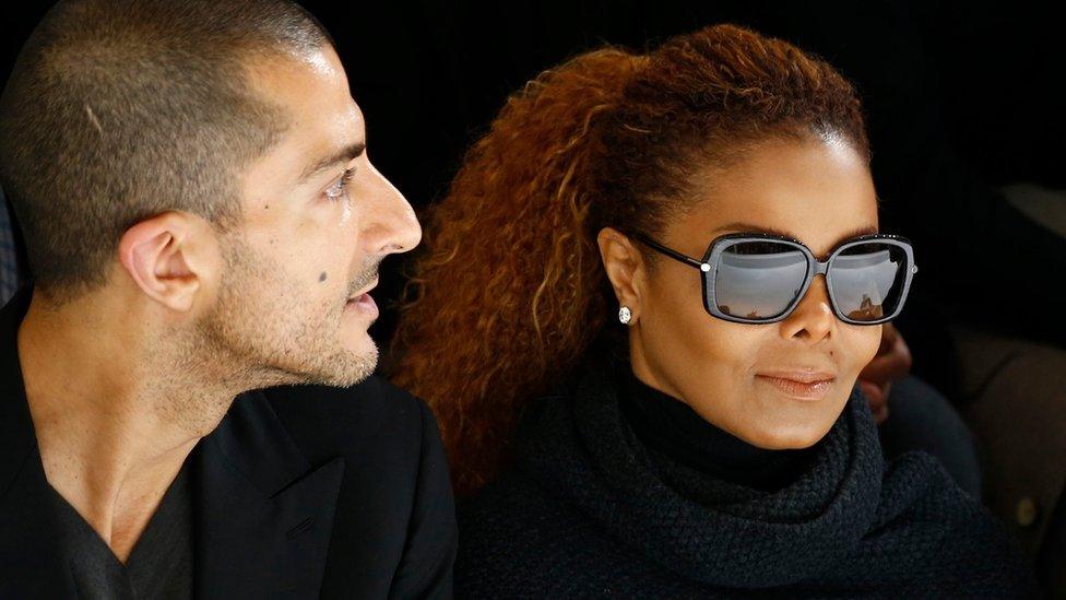 Artist Janet Jackson (C) and her husband Wissam Al Mana (L) attend the Hermes Spring/Summer 2016 women"s ready-to-wear collection show in Paris, France, October 5, 2015.