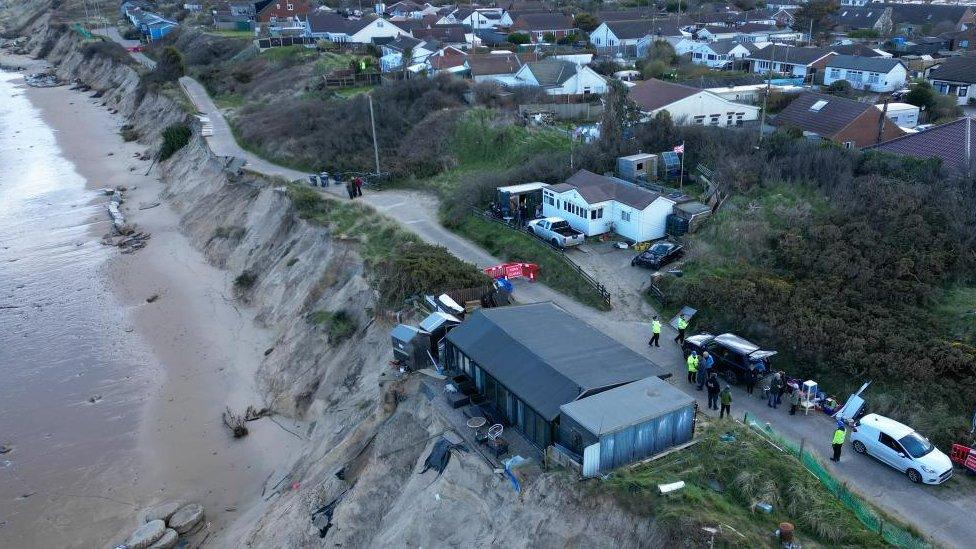 Lance Martin's home with the road collapse is in view