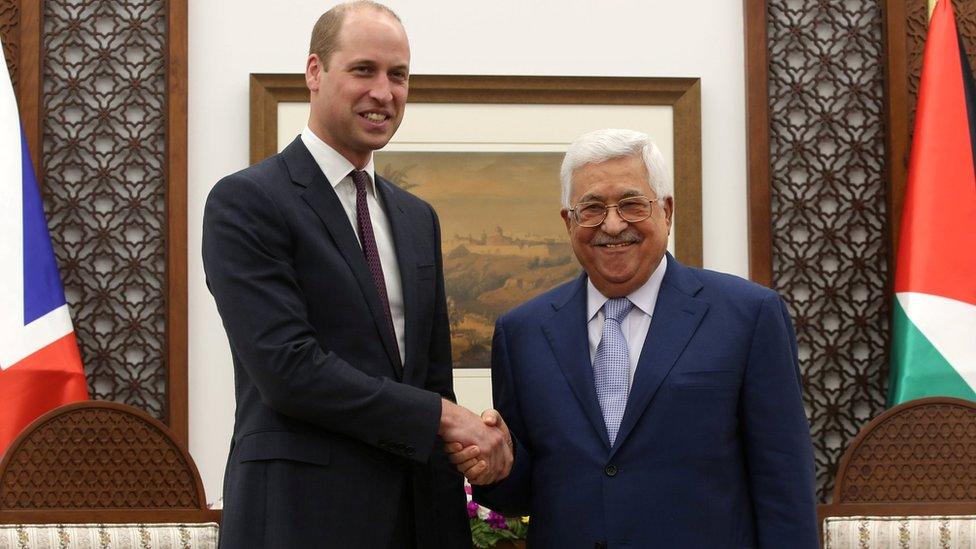 Palestinian President Mahmoud Abbas shakes hands with Prince William during their meeting in Ramallah on 27 June 2018