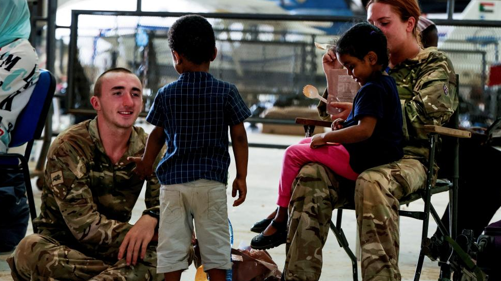 British Army looking after children at Wadi Seidna Air Base