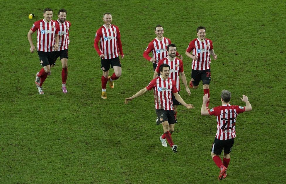 Sunderland players celebrate penalty win