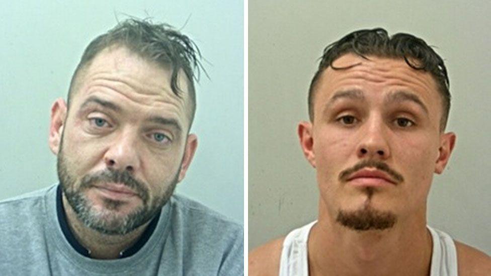 Police mugshots of Tom Lee (l) and Freddy Young (r). Lee's dark hair is shaved at the side and long on top, and he has a moustache and beard; he wears a grey sweatshirt. Young's hair is also short at the sides and longer on top. He has a moustache and goatee, and is wearing a white vest.
