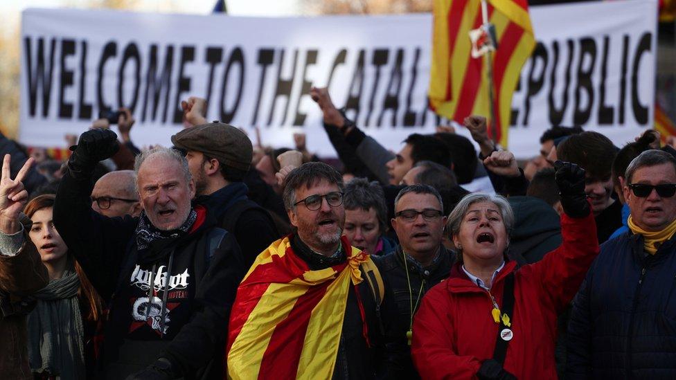 People gather during a protest against Spain's cabinet meeting in Barcelona, Spain, December 21, 2018.