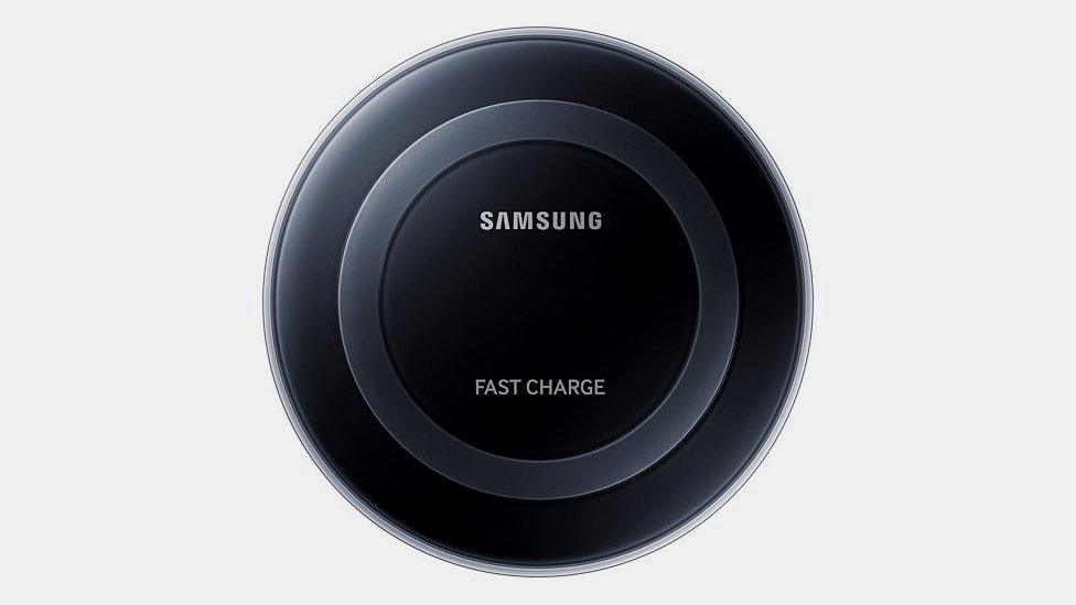 A black Samsung charging pad