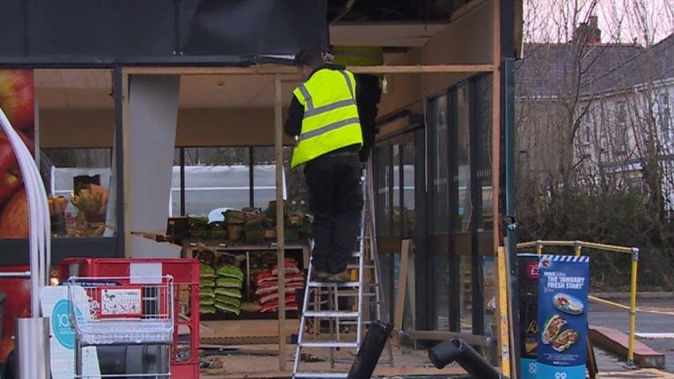 The damaged front of the Co-op store in Llandovery