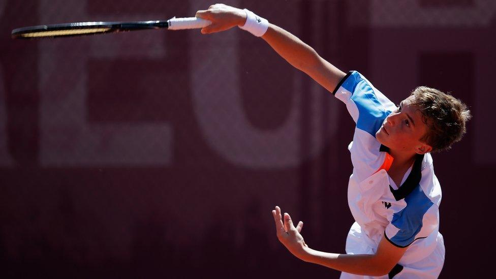 Stefanos Tsitsipas of Greece serves in the Boys Tennis Semi Final match against Marko Osmakcic of Switzerland on Day 4 of the European Youth Olympic Festival held at Den Hommel Tennis Park on July 18, 2013