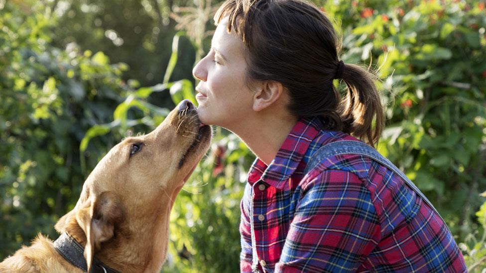 A woman with her dog